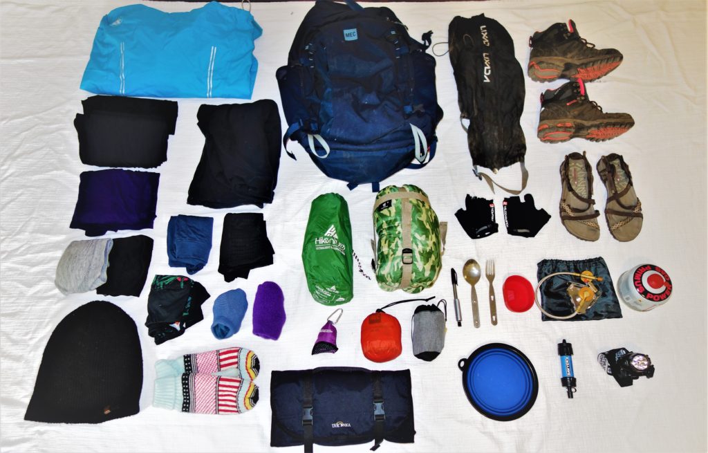 The Woman's Pack - A complete packing checklist of all essential gear and equipment you need to pack for a multi day backpacking hike.